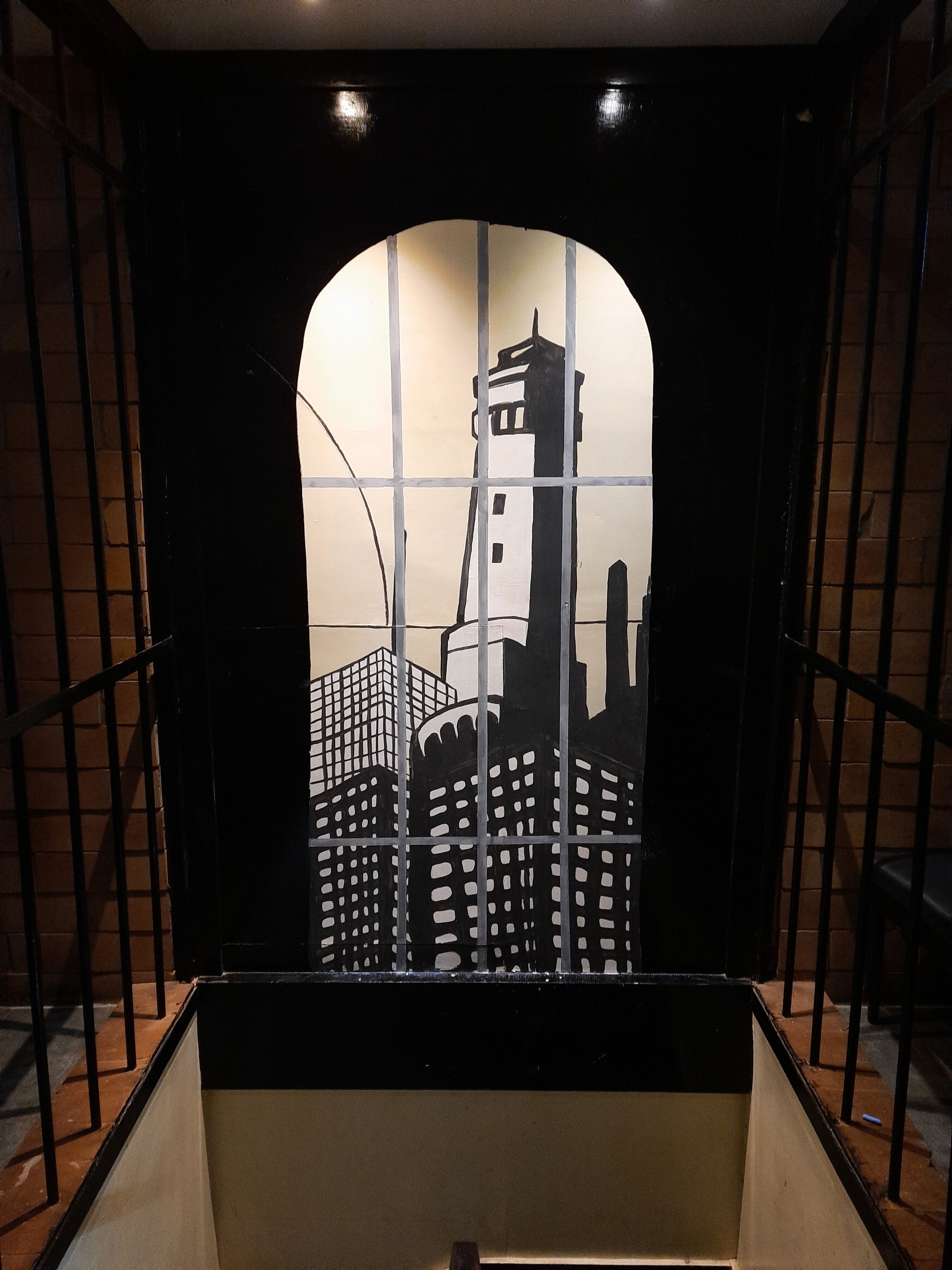 A completed section of the black-and-white mural installation.