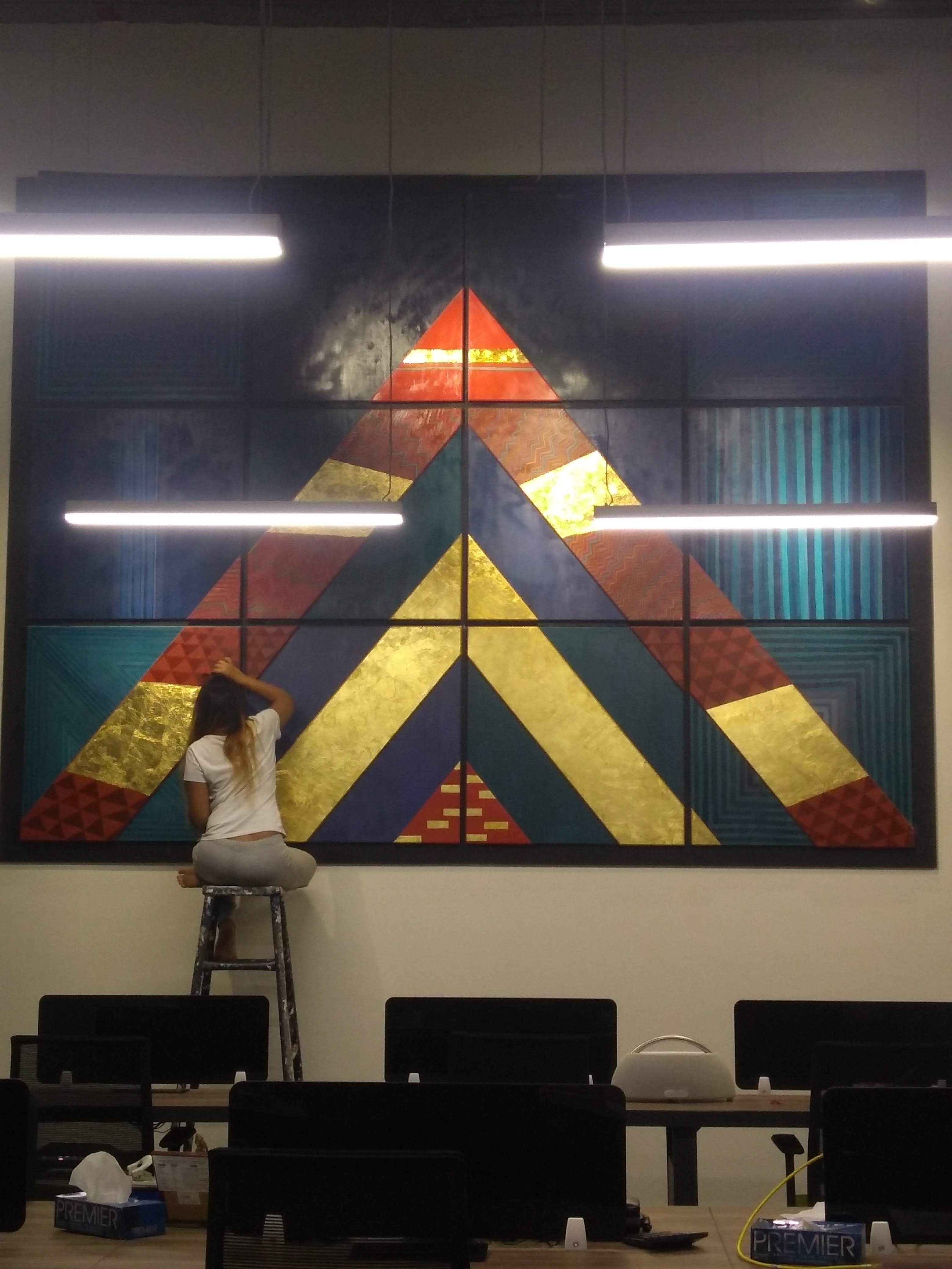 The completed Anand Rathi installation seen across the office interior.